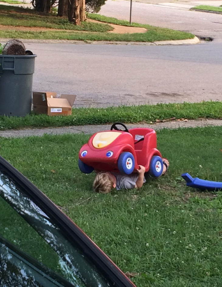 Kids Bad at Hide and Seek under toy car