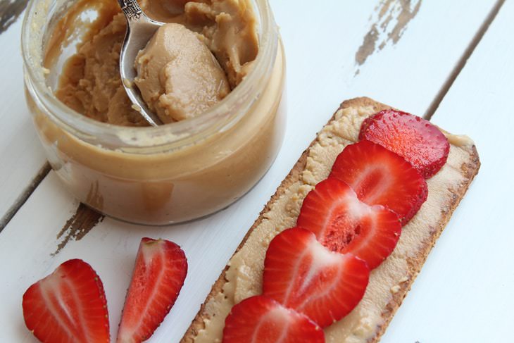 Peanut Butter vs Almond Butter peanut butter sandwich strawberries