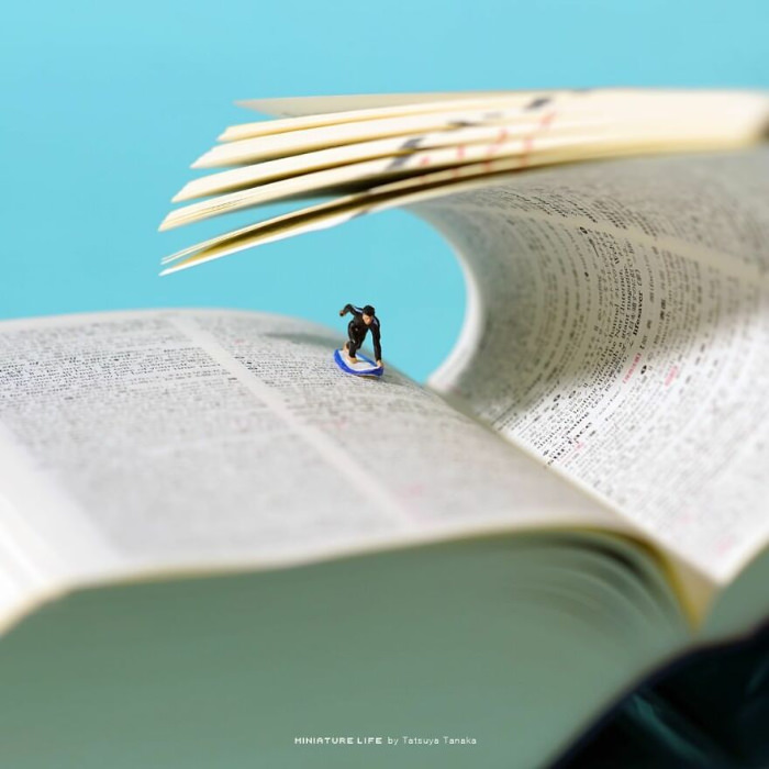Miniature art by Tatsuya Tanaka man surfing book