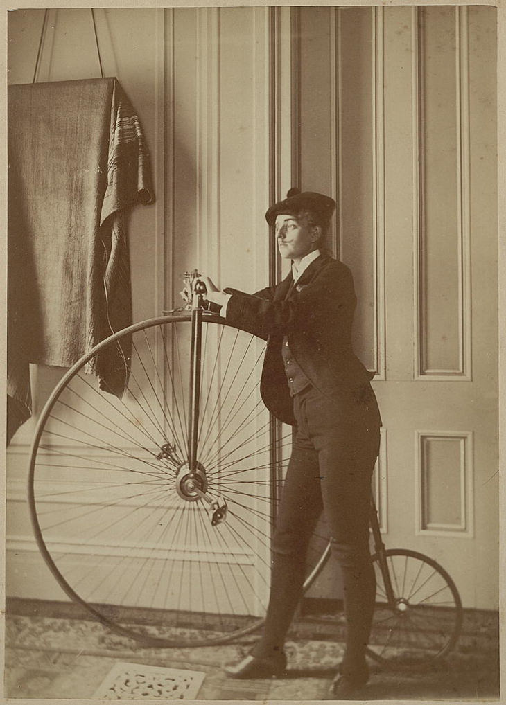 1880-1900s Bike photos A Woman's self-portrait dressed as a man with his penny-farthings, 1890