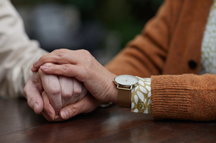 Parkinson’s Disease Test holding hands