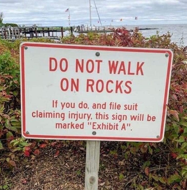 Funny Signs don't walk on rocks