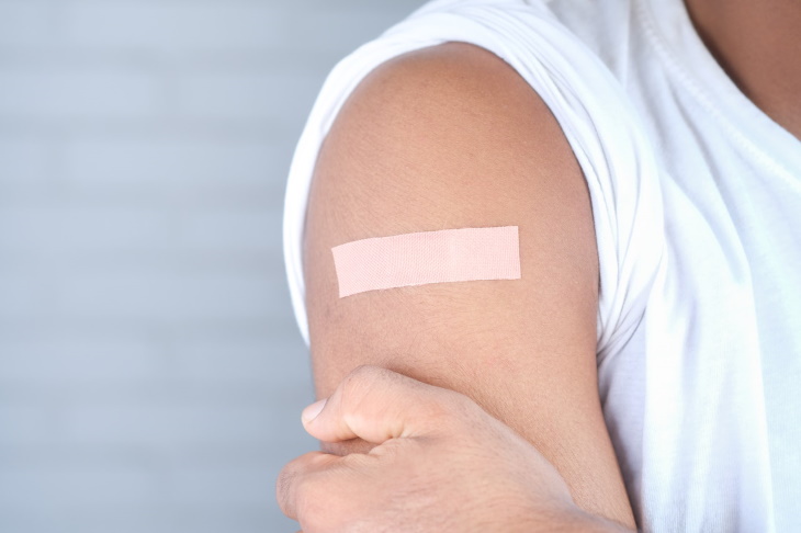 Signs of a Healthy Diet band aid on skin