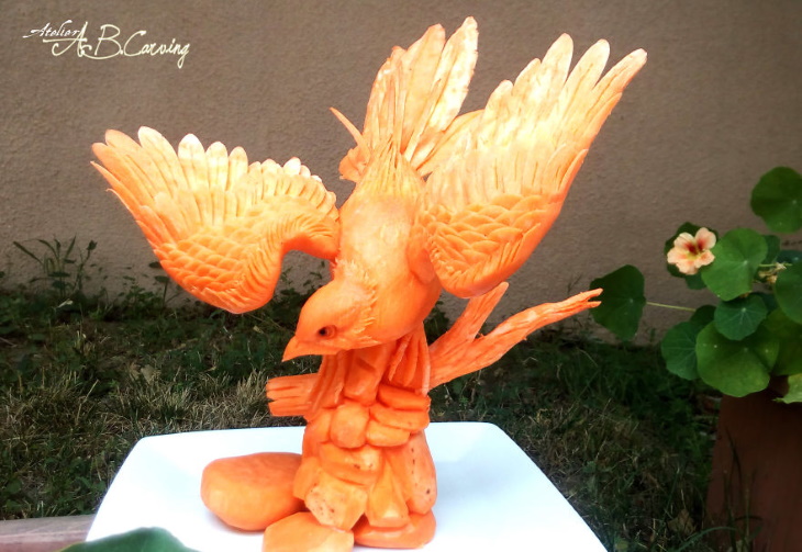 Angel Boraliev Pumpkin Carving bird on a branch