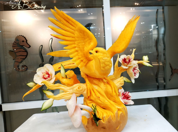 Angel Boraliev Pumpkin Carving bird and flowers