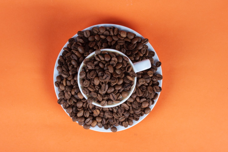 Coffee and Heart Health coffee beans in an espresso cup