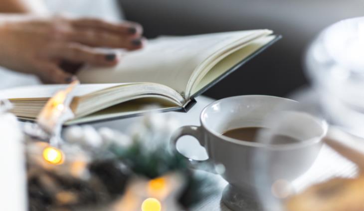 reading with a cup of coffee