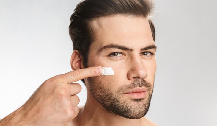 Beard Psoriasis - Man putting on face cream