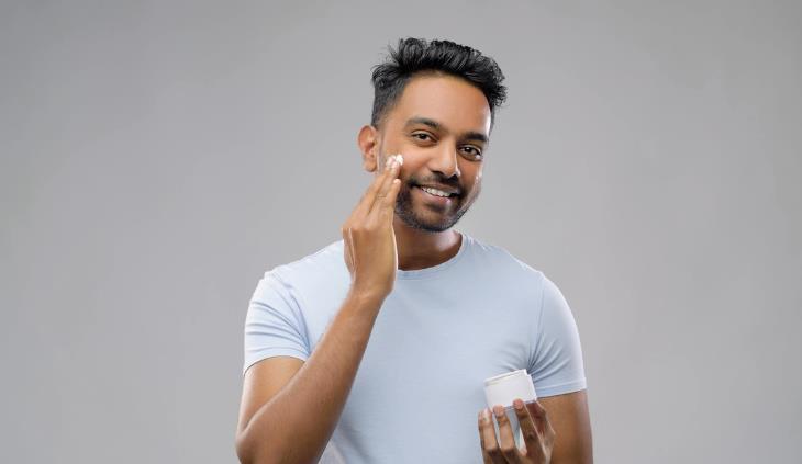 Beard Psoriasis - Man putting on face cream