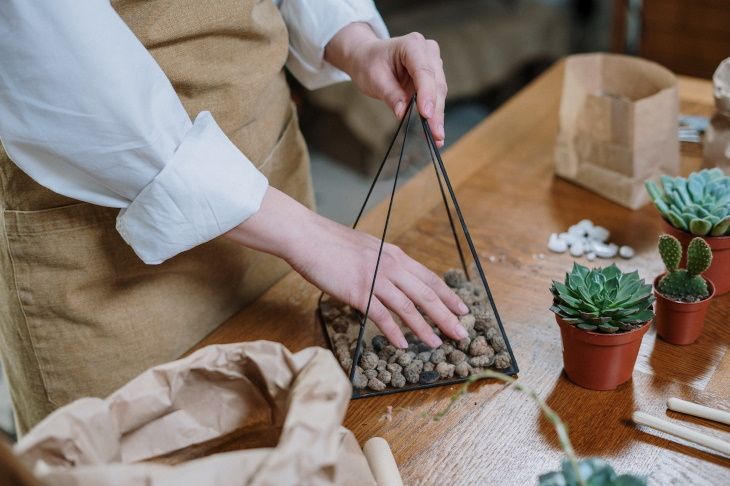 DIY Glass Terrarium adding drainage to terrarium