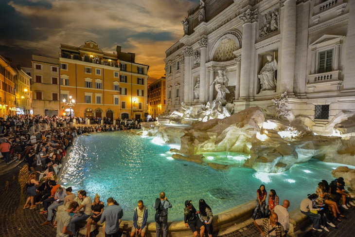 Trevi Fountain people around the fountain