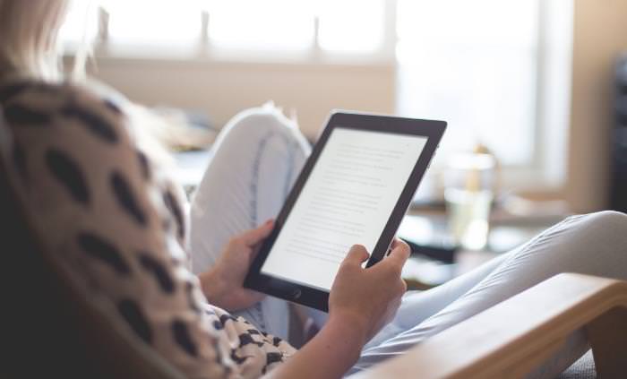 Free e-book, woman reading ebook