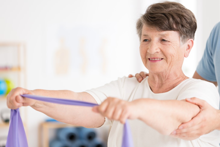 Stroke Myths older woman doing physical therapy