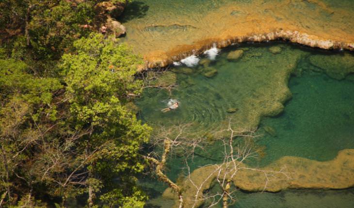 SEMUC CHAMPEY man in pool