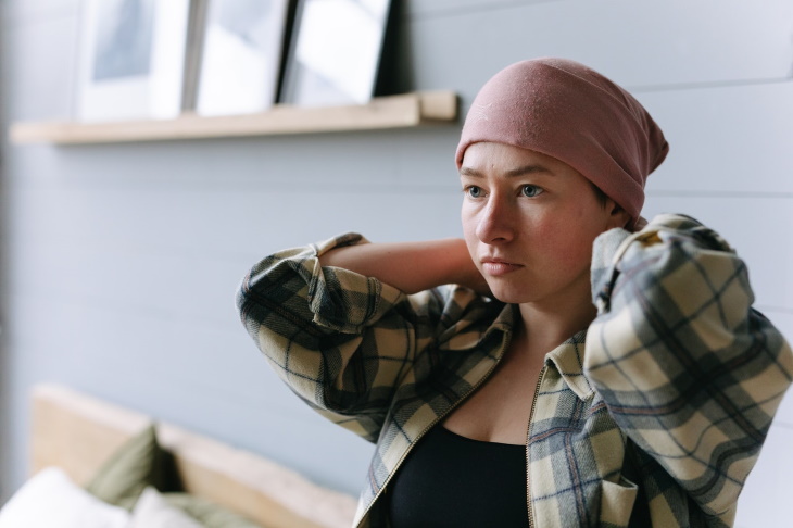 Pediatric Liver Cancer teenage putting on headscarf