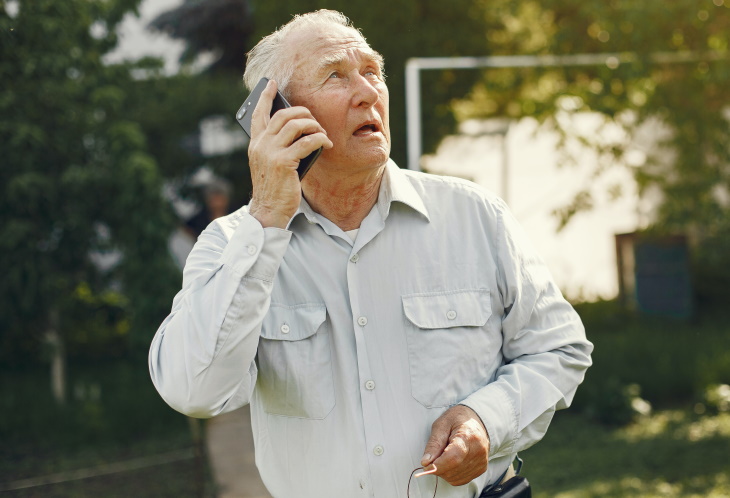 Causes of Hearing Loss older man talking on the phone confused