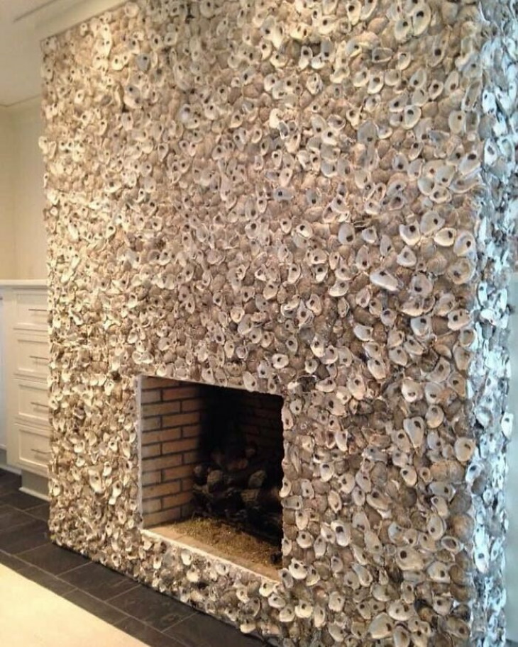 Creative Interiors fireplace decorated with oyster shells