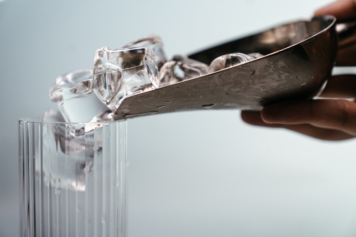 Symptoms of Anemia ice being poured into a glass