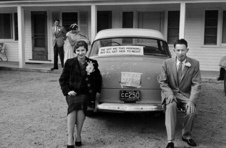 Vintage Photos A newlywed couple in front of their car with a Just Married sign in New Hampshire, 1958