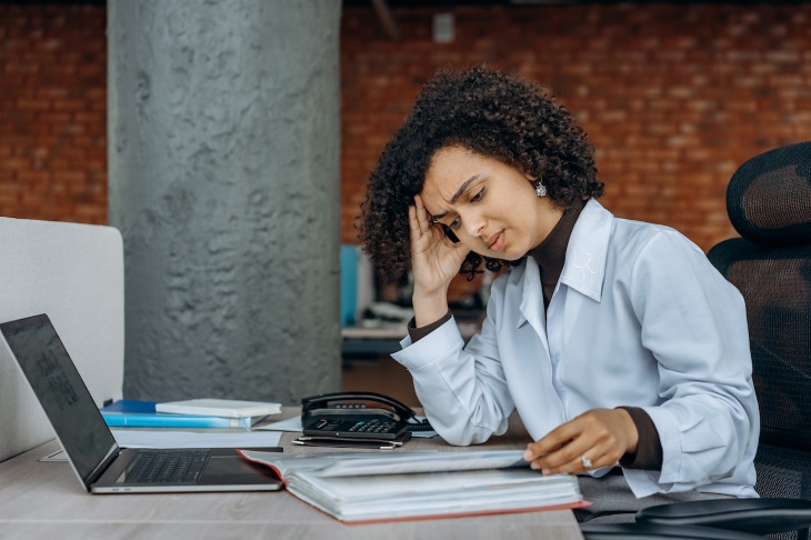 Burnout Recovery woman confused at work