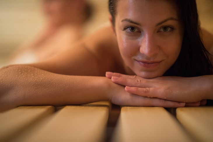 Sauna vs Steam Room woman in a Sauna