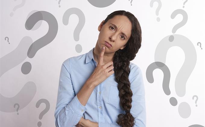 Toxic relationship test: A woman is surrounded by question marks