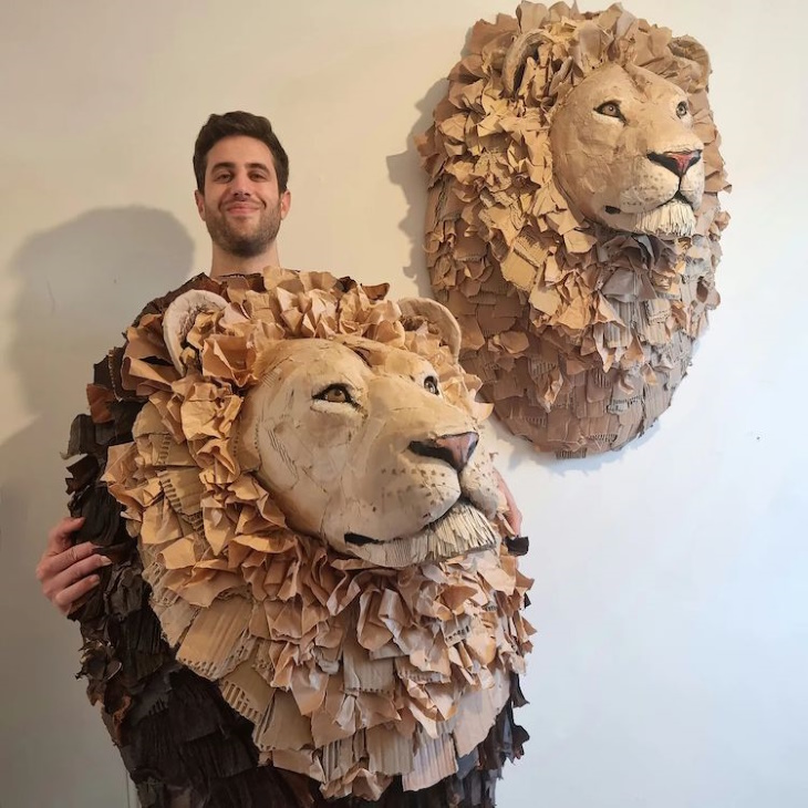 Cardboard Animal Sculptures by Josh Gluckstein two lions and artist