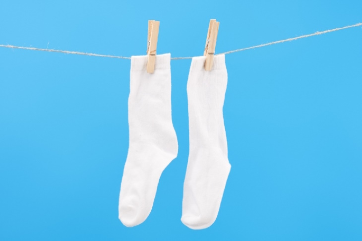 Revive Dirty White Socks hanging socks