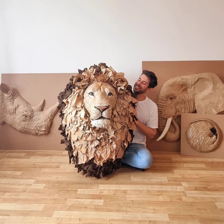 Cardboard Animal Sculptures by Josh Gluckstein artist with many sculptures