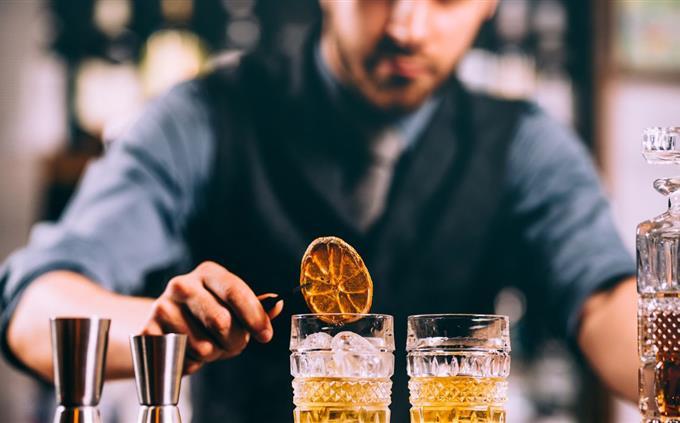 Test which car is suitable for you to drive: a bartender prepares a drink