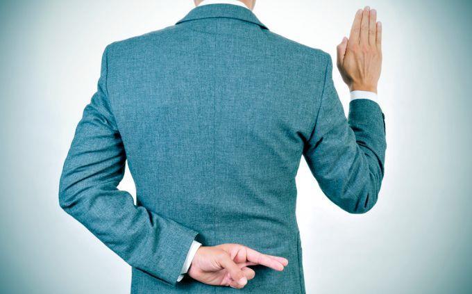 Are you a liar: Man holding fingers behind his back