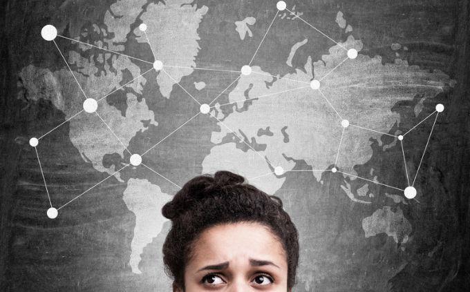 Trivia from strange customs from around the world: A worried woman under a world map
