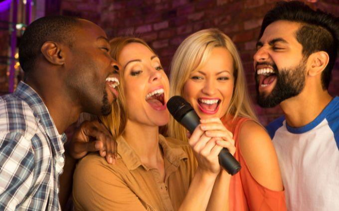 Are you a predictable person: people singing into a microphone