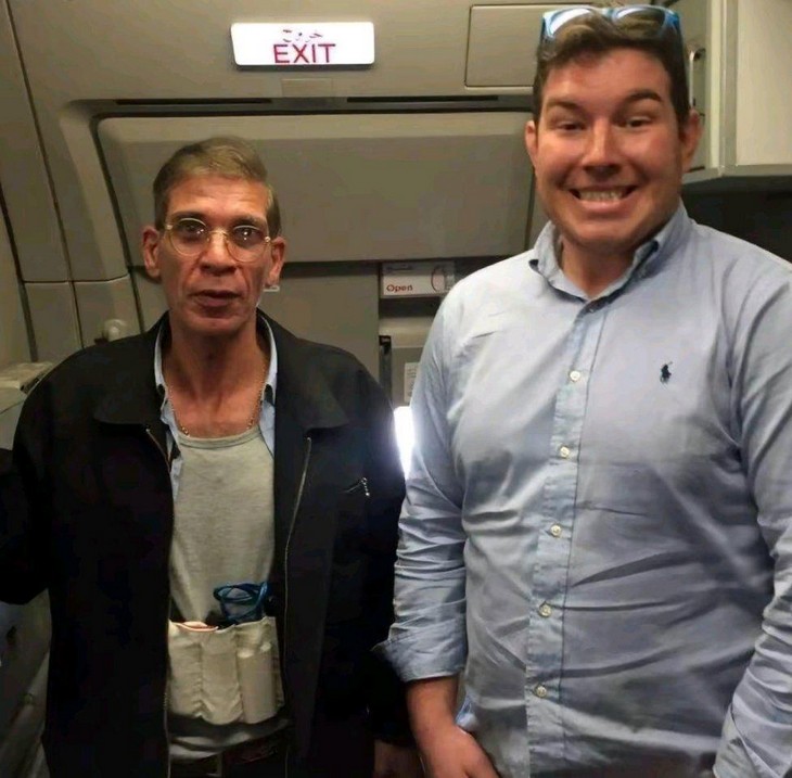 Things you don’t see every day: Man taking a photo with a terrorist on a plane