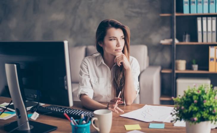 What to do when frustrated in a relationship: woman sitting at a desk