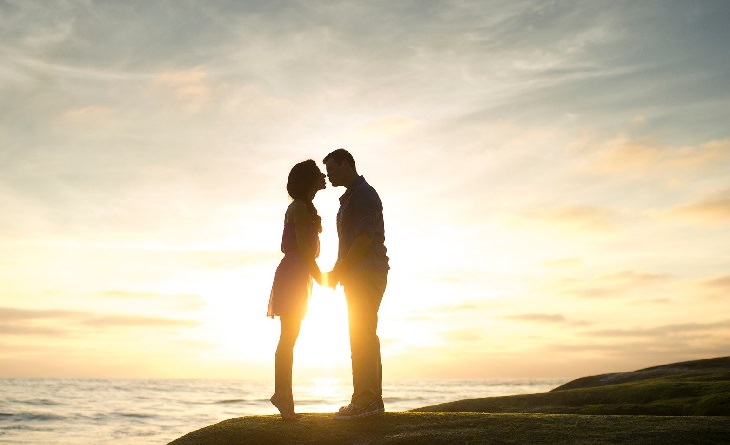 Holding Grudges in Relationships: Couple at Sunset