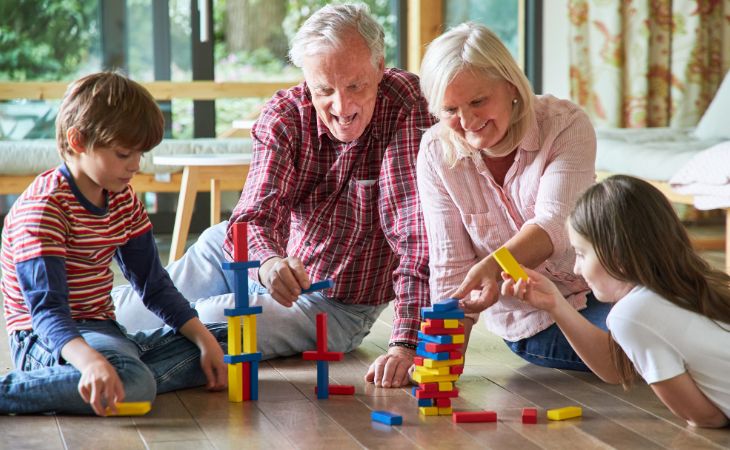 Why the bond between grandchildren and grandparents is important and how to strengthen it: Grandparents playing with grandchildren