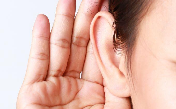 Are you an attentive person or a talkative person: a woman with an ear down