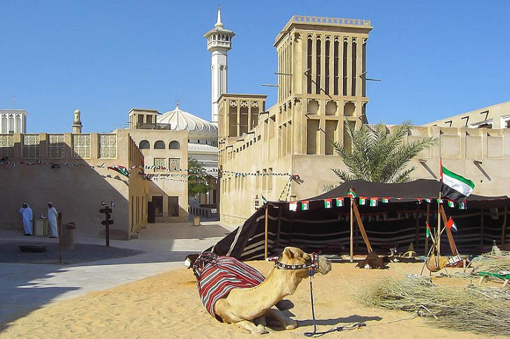 Dubai attractions: Buildings and a tent with a camel in Al Fahidi Neighborhood