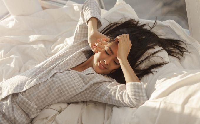 Where will you be in 5 years according to your dreams: A woman wakes up in bed