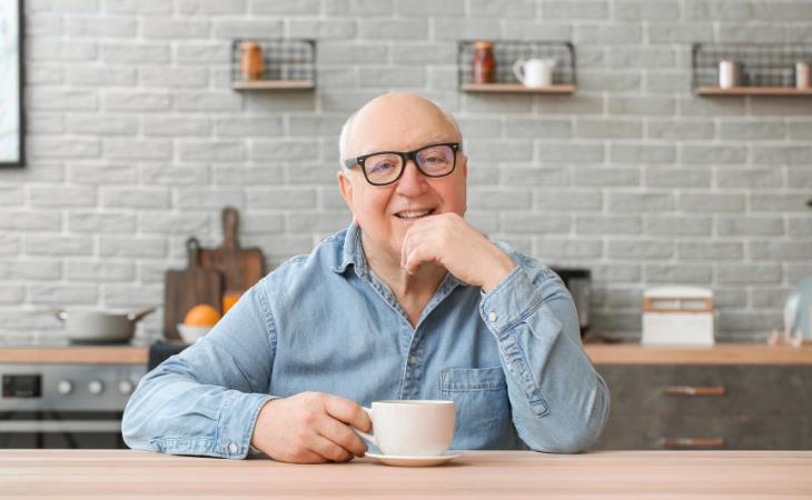 elderly man with coffee