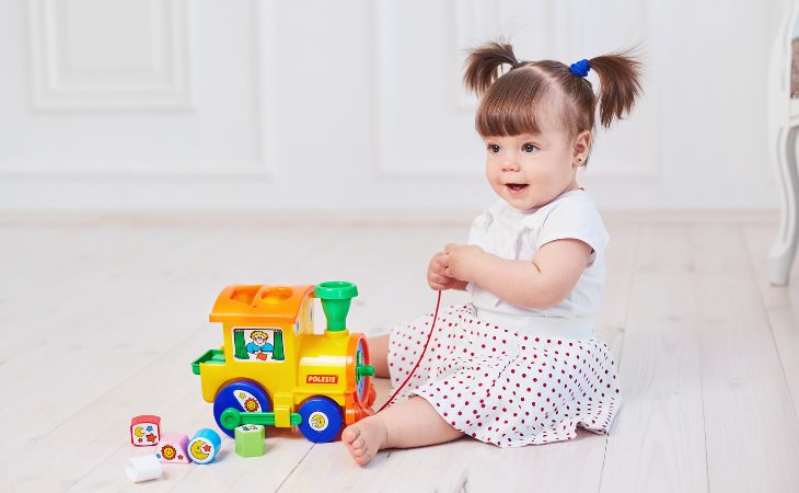 girl toddler with toy