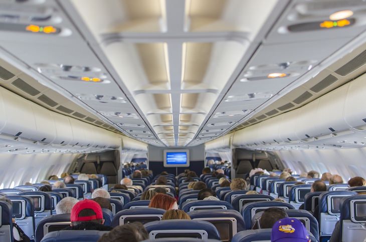 Things to avoid on a flight: passengers in an airplane cabin