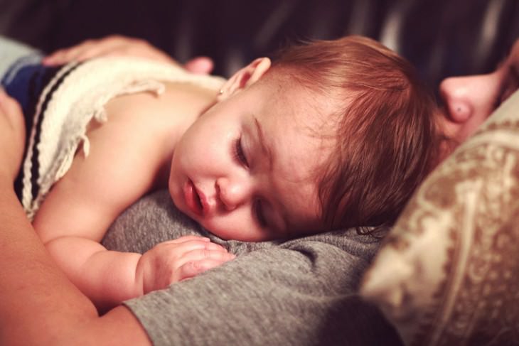 Child skin problems: A baby sleeping on their mother