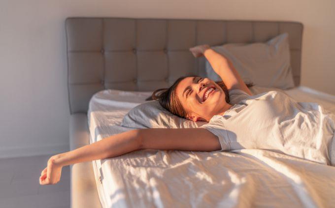 What moment of the day are you: a woman waking up in bed