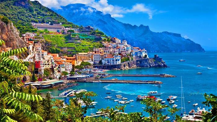 The Amalfi Coast in Italy: Colorful houses and a marina by the sea