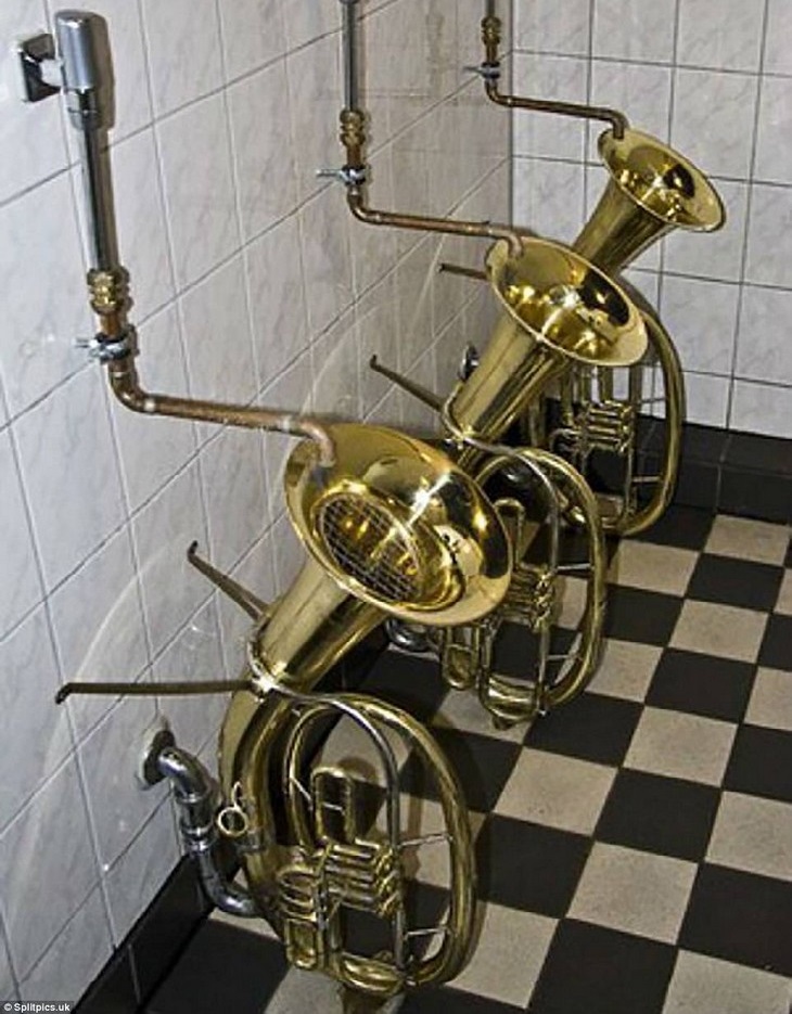 Bizarre Toilets: Men's restroom where the urinals are trumpets