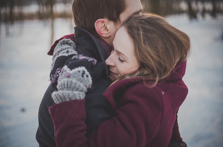 Questions for a Better Relationship: Couple hugging in the snow