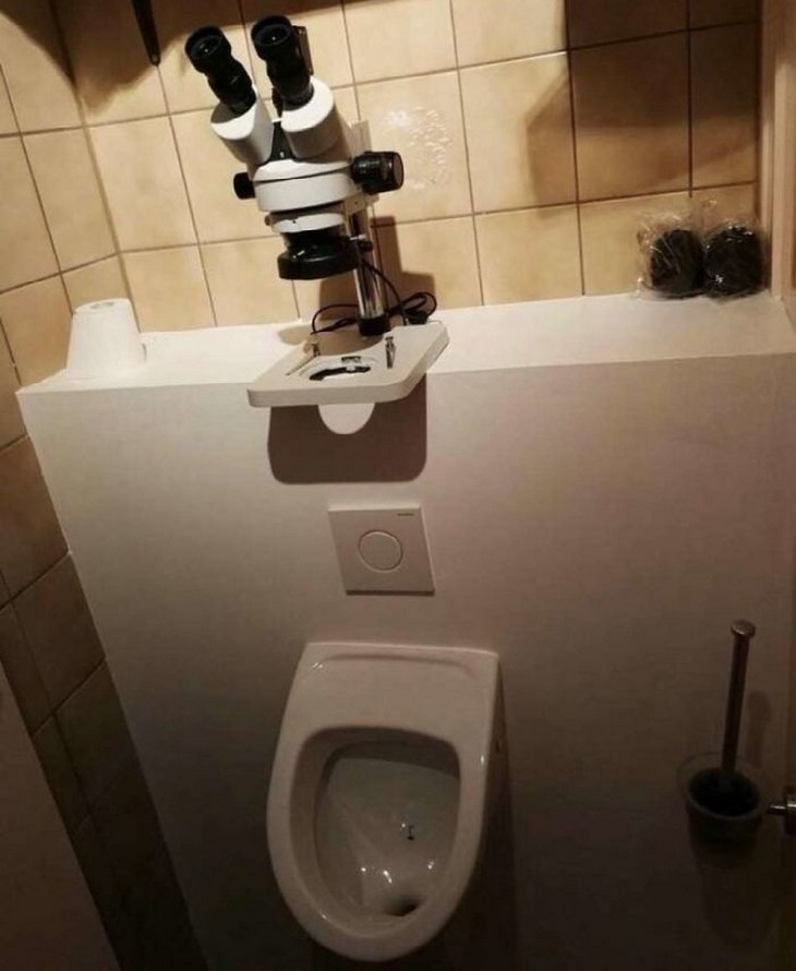 Bizarre Toilets: A urinal with a stethoscope above it