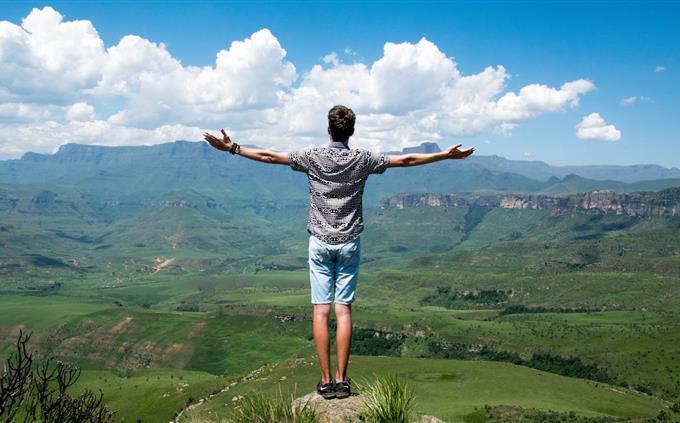 Favorite Fruit Test: A young man in front of a green landscape